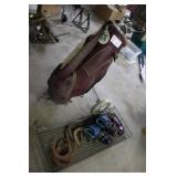 Golf Bag with Clubs, Inline Skates, Horseshoes, Air Pump, and Practice Net