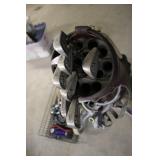 Golf Bag with Clubs, Inline Skates, Horseshoes, Air Pump, and Practice Net