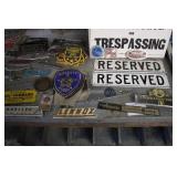 Collection of Vintage Metal Signs, Badges, and License Plates