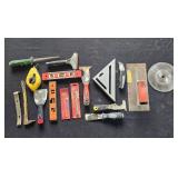 Collection of Hand Tools and Accessories Including Levels, Scrapers, and Utility Knives Collection of Hand Tools and Accessories Including Levels, Scrapers, and Utility Knives