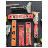 Collection of Hand Tools and Accessories Including Levels, Scrapers, and Utility Knives Collection of Hand Tools and Accessories Including Levels, Scrapers, and Utility Knives