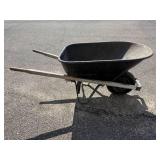 Used Single-Wheel Garden Wheelbarrow with Wooden Handles Used Single-Wheel Garden Wheelbarrow with Wooden Handles