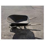 Used Single-Wheel Garden Wheelbarrow with Wooden Handles Used Single-Wheel Garden Wheelbarrow with Wooden Handles