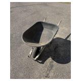 Used Single-Wheel Garden Wheelbarrow with Wooden Handles Used Single-Wheel Garden Wheelbarrow with Wooden Handles