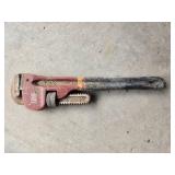Assorted Pipe Fittings and Used Pipe Wrench in Toolbox Assorted Pipe Fittings and Used Pipe Wrench in Toolbox