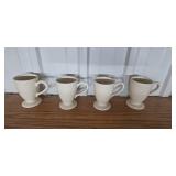 Set of Cream Stoneware Mugs with Quilted Pot Holders and Trivets Set of Cream Stoneware Mugs with Quilted Pot Holders and Trivets