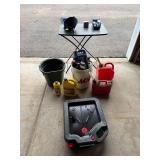 Garage Oil Change and Fluid Supplies Lot with Funnel, Gas Cans, Buckets, and More - content quantities unknown Garage Oil Change and Fluid Supplies Lot with Funnel, Gas Cans, Buckets, and More - content quantities unknown