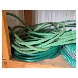 Group of Green Garden Hoses in Various Lengths Group of Green Garden Hoses in Various Lengths