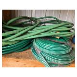 Group of Green Garden Hoses in Various Lengths Group of Green Garden Hoses in Various Lengths