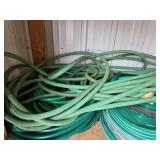 Group of Green Garden Hoses in Various Lengths Group of Green Garden Hoses in Various Lengths