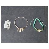 Trio of Jewelry: Surgical Steel Key Navel Ring, Charm Bangle, Turtle Beaded Bracelet Trio of Jewelry: Surgical Steel Key Navel Ring, Charm Bangle, Turtle Beaded Bracelet