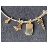 Trio of Jewelry: Surgical Steel Key Navel Ring, Charm Bangle, Turtle Beaded Bracelet Trio of Jewelry: Surgical Steel Key Navel Ring, Charm Bangle, Turtle Beaded Bracelet