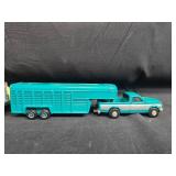 Set of Die-Cast Vehicle Models: Greyhound Bus, Yellow Coupe, Farm Truck with Trailer Set of Die-Cast Vehicle Models: Greyhound Bus, Yellow Coupe, Farm Truck with Trailer