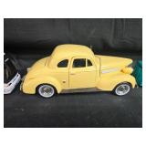 Set of Die-Cast Vehicle Models: Greyhound Bus, Yellow Coupe, Farm Truck with Trailer Set of Die-Cast Vehicle Models: Greyhound Bus, Yellow Coupe, Farm Truck with Trailer
