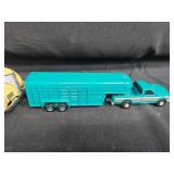 Set of Die-Cast Vehicle Models: Greyhound Bus, Yellow Coupe, Farm Truck with Trailer Set of Die-Cast Vehicle Models: Greyhound Bus, Yellow Coupe, Farm Truck with Trailer