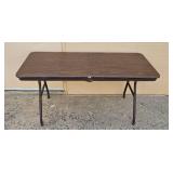 Folding Utility Table with Wood Grain Finish 59x30 Inches Folding Utility Table with Wood Grain Finish 59x30 Inches