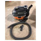RIDGID 4 Gal. 5.0 Peak HP Portable Shop Vacuum Wet Dry Vac with Fine Dust Filter, Locking Hose and Attachments WD4070Used Good  Customer Returns See Pictures