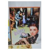 Assorted Vintage-Style Tin Advertising and Movie Signs Assorted Vintage-Style Tin Advertising and Movie Signs