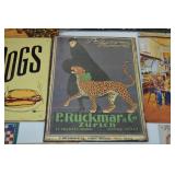 Assorted Vintage-Style Tin Advertising and Movie Signs Assorted Vintage-Style Tin Advertising and Movie Signs