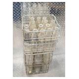 Mid-20th Century Vintage Wire Milk Crates with Assorted Glass Milk Bottles Mid-20th Century Vintage Wire Milk Crates with Assorted Glass Milk Bottles