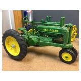 4 John Deere Cast Tractors Including Nice ERTL Model A 4 John Deere Cast Tractors Including Nice ERTL Model A