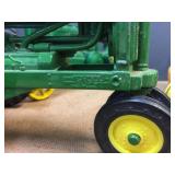 4 John Deere Cast Tractors Including Nice ERTL Model A 4 John Deere Cast Tractors Including Nice ERTL Model A