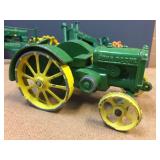 4 John Deere Cast Tractors Including Nice ERTL Model A 4 John Deere Cast Tractors Including Nice ERTL Model A