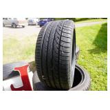 Set of 4 Brand New Dunlop Conquest Sport A/S Tires