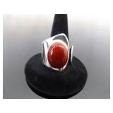 .925 Sterling Silver Coral Cabochon Adjustable Ring Currently Size 10 .925 Sterling Silver Coral Cabochon Adjustable Ring Currently Size 10
