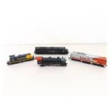Lot of 4 HO Gauge Powered Locomotives Lot of 4 HO Gauge Powered Locomotives