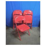 7 Red Folding Chairs