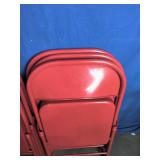 7 Red Folding Chairs