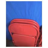 7 Red Folding Chairs