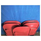 7 Red Folding Chairs