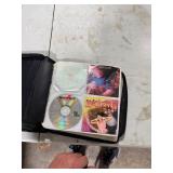 CD CASE FULL OF CDS CD CASE FULL OF CDS