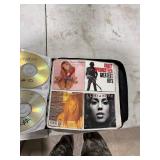 CD CASE FULL OF CDS CD CASE FULL OF CDS