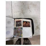 CD CASE FULL OF CDS CD CASE FULL OF CDS