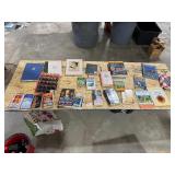 TABLE FULL OF BOOKS TABLE FULL OF BOOKS