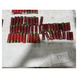 TABLE FULL OF 12 GUAGE, 16 GAUGE, 270 REM, 308 REM, 7.62X39, & AMMO CASE TABLE FULL OF 12 GUAGE, 16 GAUGE, 270 REM, 308 REM, 7.62X39, & AMMO CASE