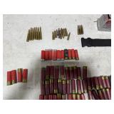 TABLE FULL OF 12 GUAGE, 16 GAUGE, 270 REM, 308 REM, 7.62X39, & AMMO CASE TABLE FULL OF 12 GUAGE, 16 GAUGE, 270 REM, 308 REM, 7.62X39, & AMMO CASE