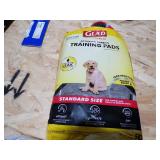 DOG CARRIER AND TRAINING PADS CLOTH CARRIER IS SUPER CLEAN AND 50 TRAINING PADS W/10 LG MEDILINE PADS DOG CARRIER AND TRAINING PADS CLOTH CARRIER IS SUPER CLEAN AND 50 TRAINING PADS W/10 LG MEDILINE PADS