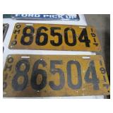 Antique Wrench and License Plates.