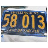 Antique Wrench and License Plates.