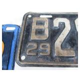 Antique Wrench and License Plates.