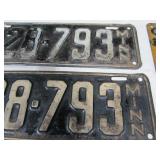 Antique Wrench and License Plates.