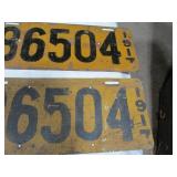 Antique Wrench and License Plates.