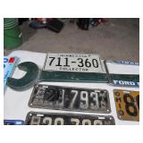 Antique Wrench and License Plates.