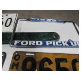 Antique Wrench and License Plates.