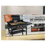 Blackstone Original 4-Burner 36" Propane Omnivore Outdoor Griddle with Hood and Folding Side Shelves Blackstone Original 4-Burner 36" Propane Omnivore Outdoor Griddle with Hood and Folding Side Shelves