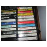 Assorted Cassette Tapes and Cassette Storage